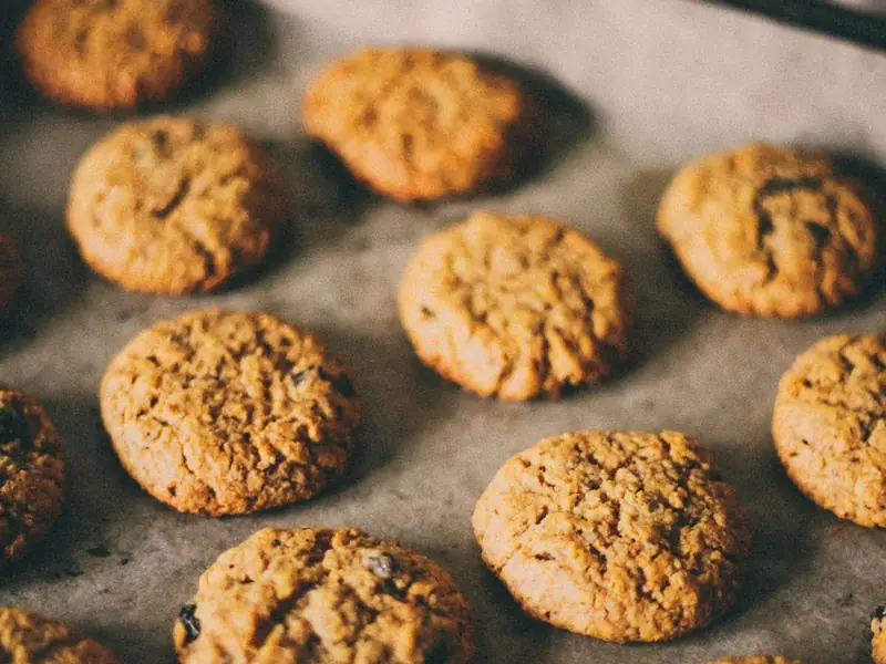 A tray of freshly baked oatmeal biscuits